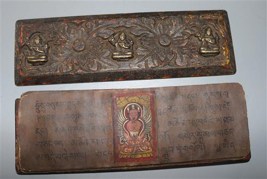 A Tibetan wood and bronze prayer book